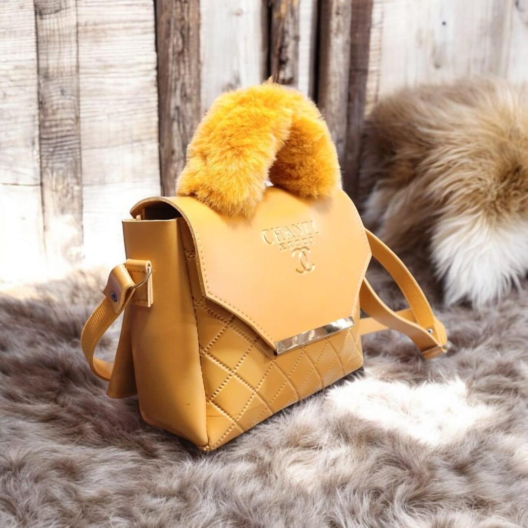 Luxury Quilted Handbag with Faux Fur Handle – Elegant Designer-Inspired Style